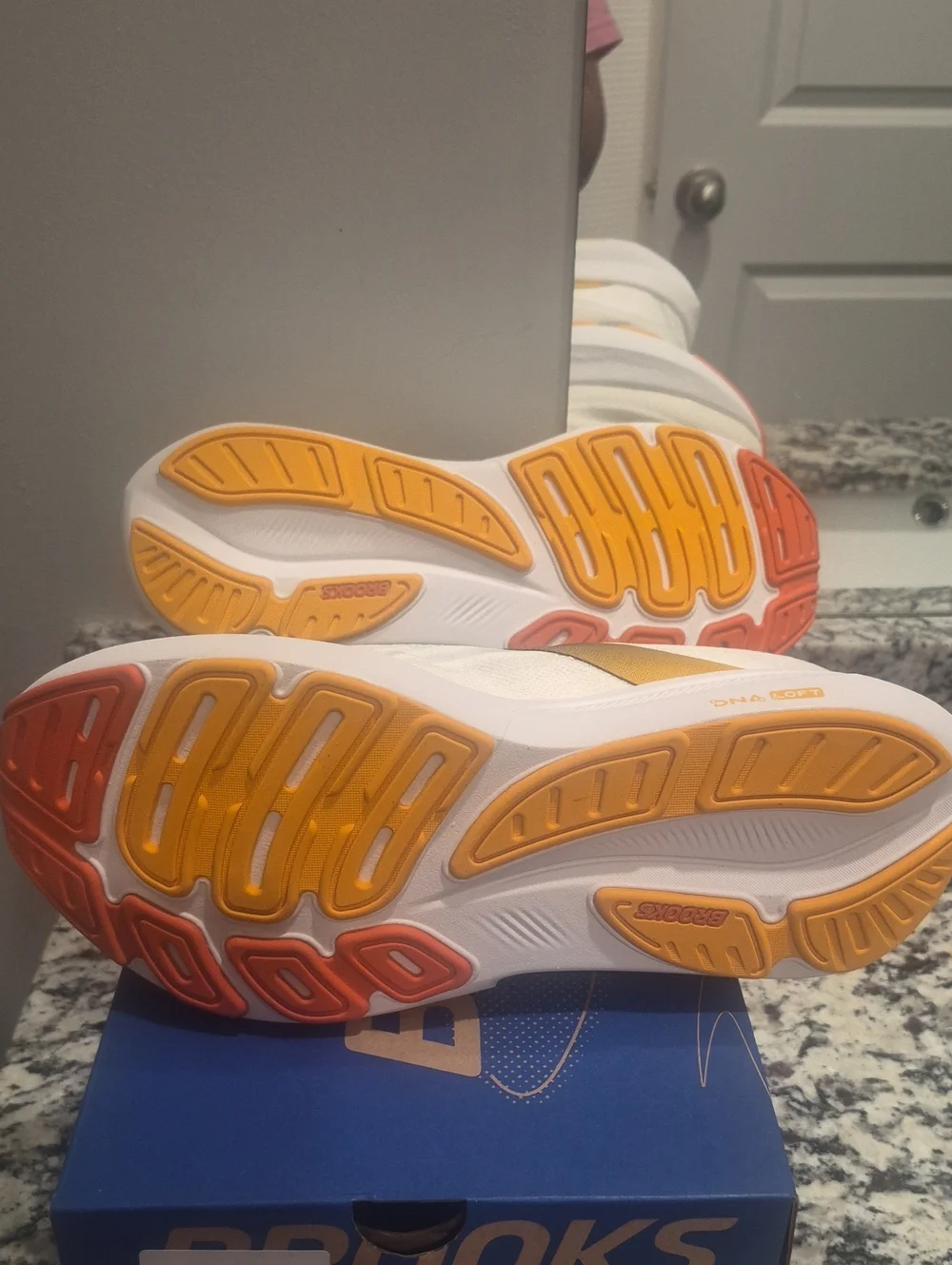 Brooks Revel 9 Men's White Running Shoes with Yellow & Coral Accents